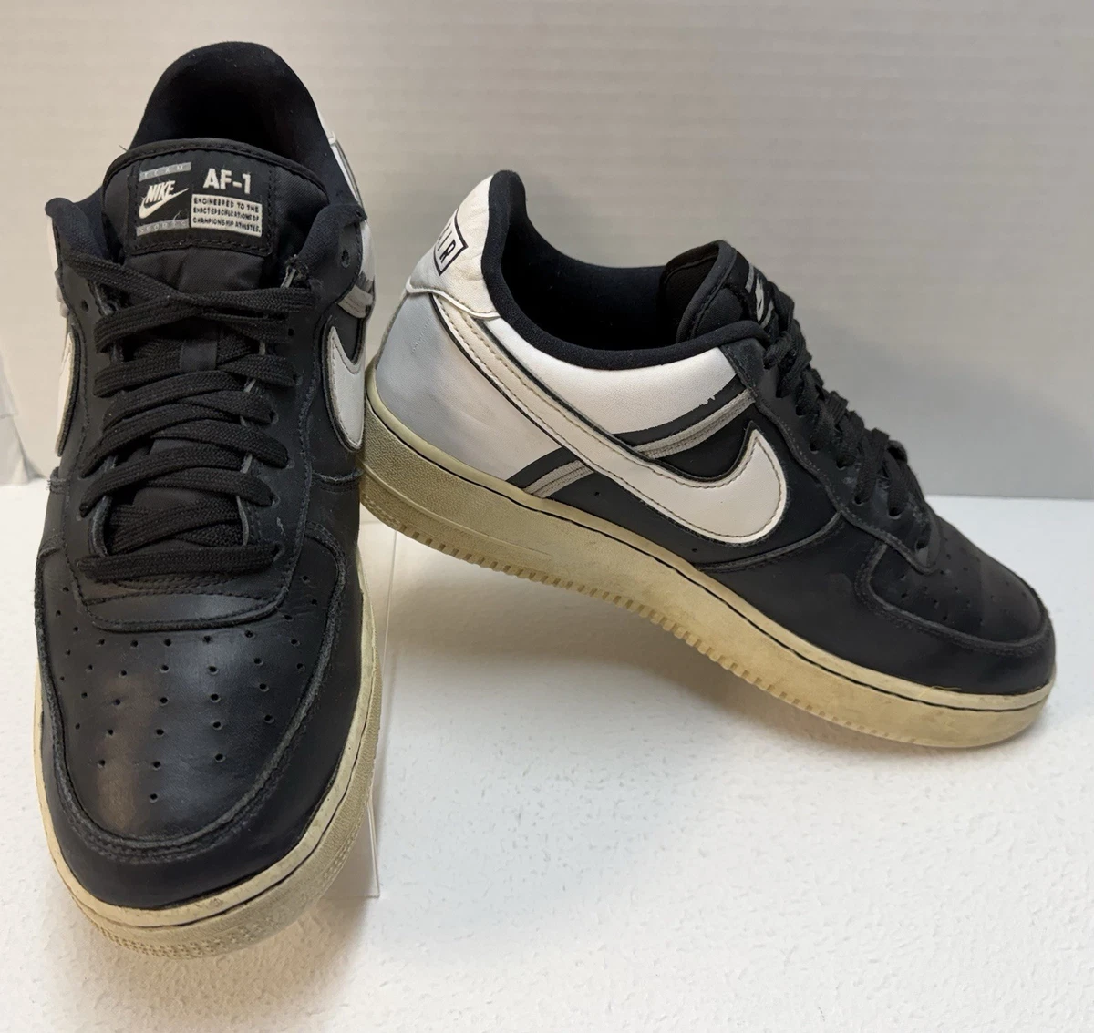 Preços baixos em Nike Air Force 1 '07 Multi Swoosh - White Black