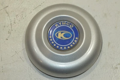 KYMCO GRAND DINK 125 EMBLEM ABDECKUNG LENKERVERKLEIDUNG OBEN VERKLEIDUNG - Bild 1 von 4