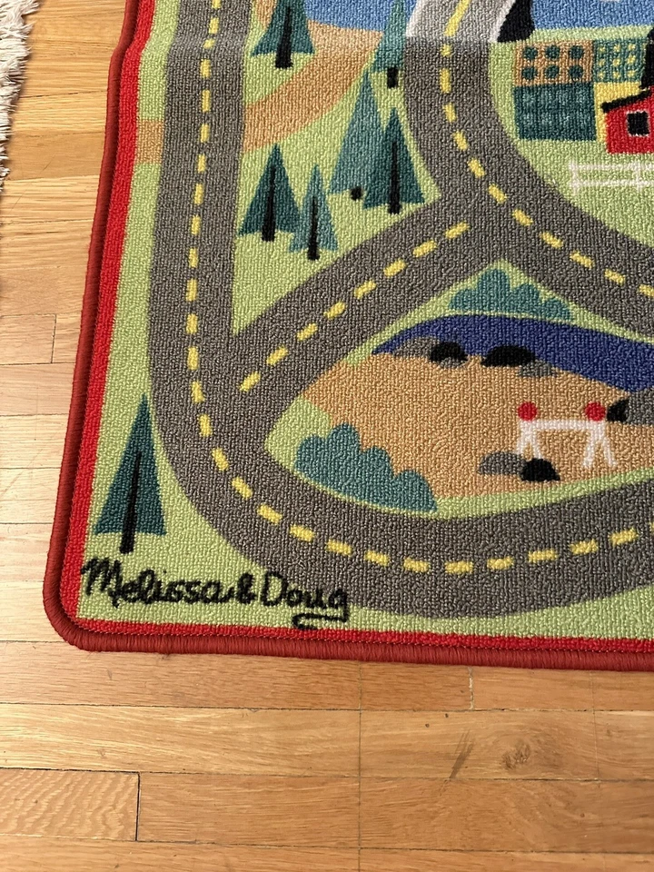 MELISSA & DOUG “ROUND THE TOWN ROAD “ALFOMBRA 39” X 36” PARA LOS MÁS PEQUEÑOS Foto 2 de 4