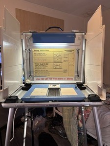 Voting Booth 2000 Election Hanging Chad Fort Meyers Florida.