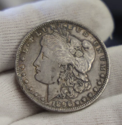 1896 US Morgan Silver Dollar $1 AU+ (Cleaned, Rim Nick)