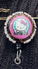 Retractable badge holder
