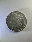 1890-O Morgan Silver Dollar Almost Uncirculated