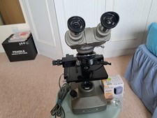 Olympus KHS microscope-3 objectives, pair of WF10x eyepieces, blue filter, light