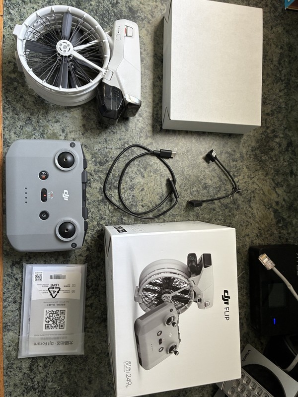dji flip drone with rcn3 controller,charging cables,gimbal covers,manual and box