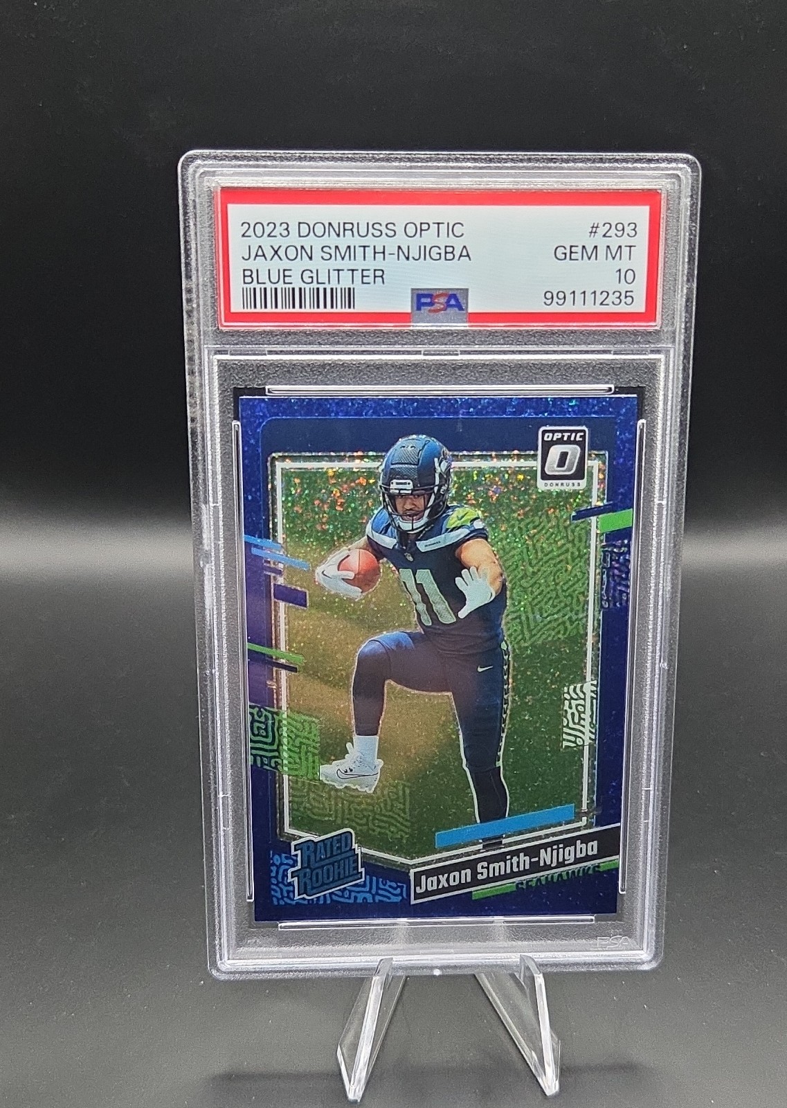 2023 Donruss Optic - Rated Rookie Jaxon Smith-Njigba #293 Blue Glitter Case Hit