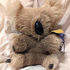 Vintage wind up musical koala