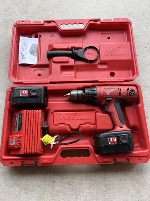 Milwaukee 18V  hammer drill set with two 18v batteries, charger, and hard case