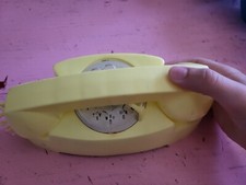 Vintage pale yellow coronet ringing phone toy telephone READ retro display kids