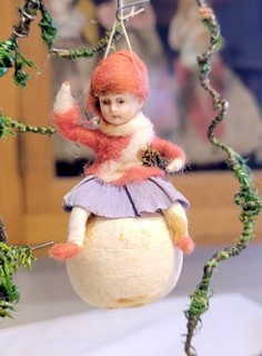 Antique Christmas Heubach Girl bisque Headed on Snowball. 1900s Germany.