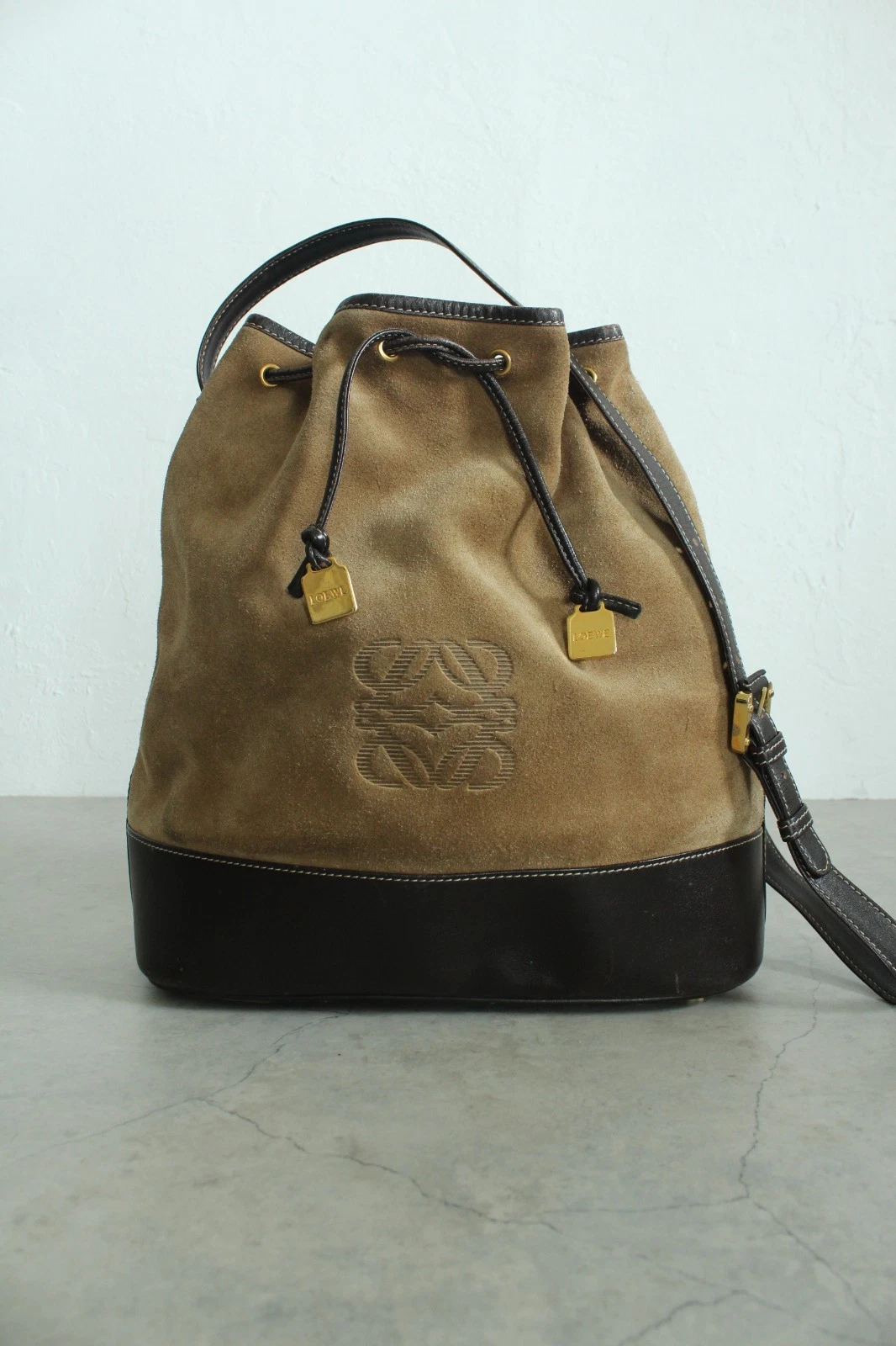 Loewe — Authentic Vintage Loewe Anagram Suede Drawstring Bucket Bag w Entrupy