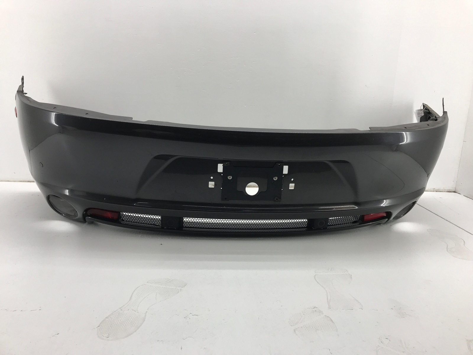 2011 ASTON MARTIN RAPIDE REAR BUMPER COVER W/ PARK ASSIST GRAY OEM