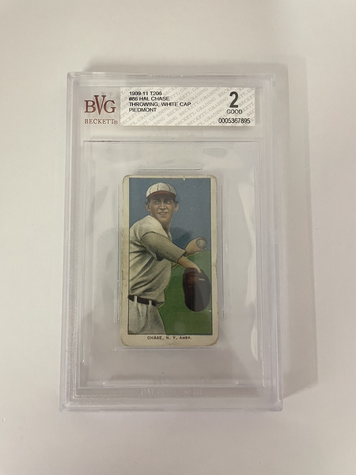 1909-11 T206 Piedmont Cigarettes #86 Hal Chase Throwing; White Cap