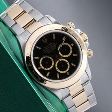 Rolex Daytona 40mm Two-Tone Black/Champagne Dial YG Bezel Oyster 16523