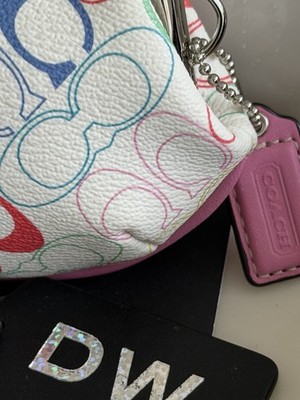 COACH PINK/MULTI SIGNATURE FLOWER COATED CANVAS KISSLOCK COIN