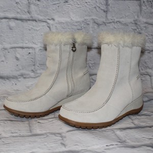 white fur wedge boots