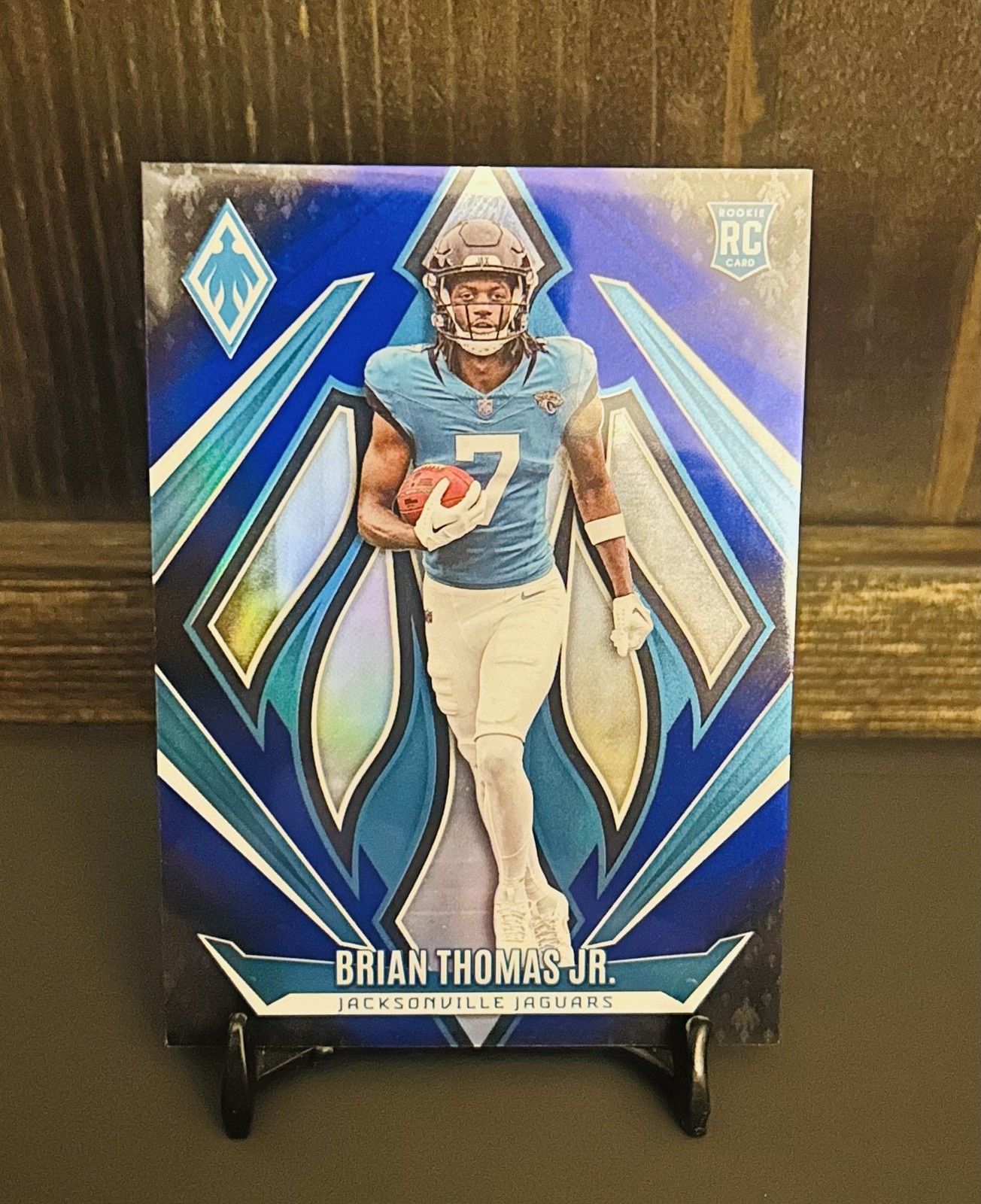 2024 Panini Phoenix - Rookies Brian Thomas Jr. #164 Blue Fade /249 (RC)