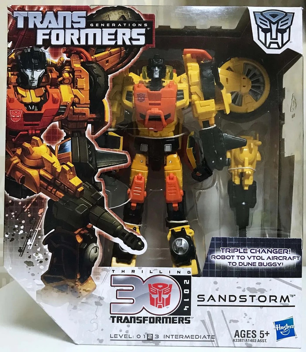 【新品】TRANSFORMERS デザートトラッカーレンジャー＆ザ・フォールン Transformers Generations IDW V Class SANDSTORM Triple Changer Gift