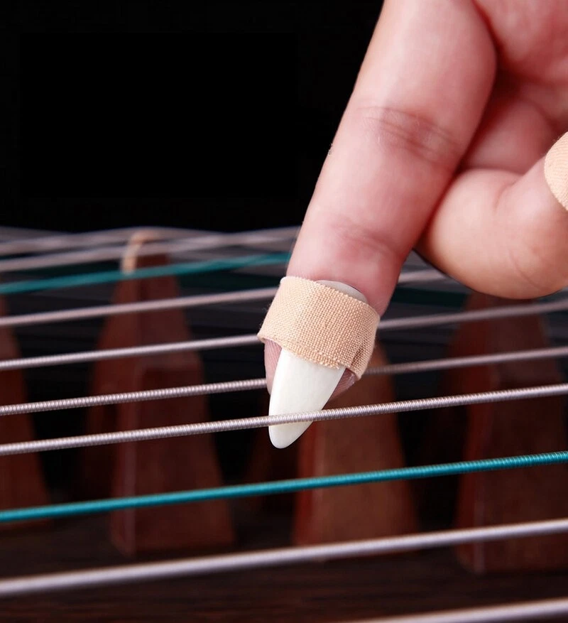 8X Buffalo Skeleton Carved Gu Zheng String Finger Picks Adult Nails - Image 3 of 3