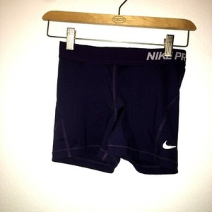 purple nike compression shorts