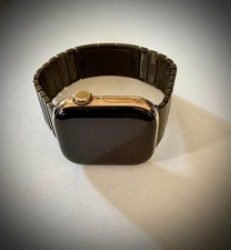 Apple Watch Series 11, 42mm, Gold Titanium case, Black Stainless Steel band