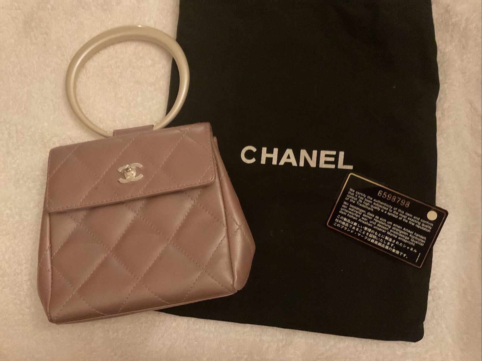 Chanel Metallic Pink Quilted Leather Vintage CC Ring Top Handle Clutch Bag