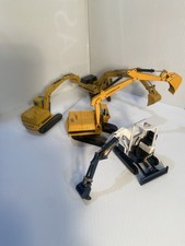 CATERPILLAR EXCAVATOR LOT OF 4: KOMATSU. NZG, SHINSEI, JOAL DIECAST TOY LOT