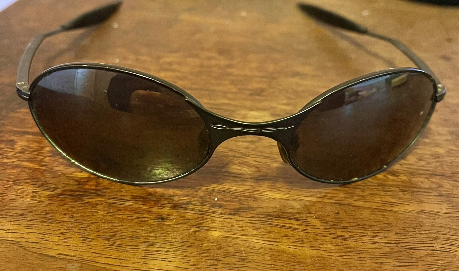 Vintage Oakley E-Wire Gen Metal Oval Frame Sunglasses Dark Grey