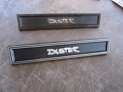 70 71 72 DUSTER DOOR PANEL EMBLEMS OEM PAIR 3499375