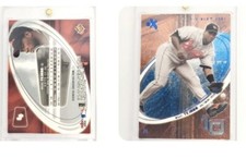 BLUE SP /4 ESSENTIAL CREDENTIALS NOW 2004 Fleer EX Miguel Tejada #4 ORIOLES RARE