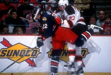 Chris Nielsen Columbus Blue Jackets checks Jay Pandolfo New - Ice Hockey Photo