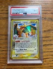 The Pokémon Company 2006 Charizard Delta Species Holo 4/100 PSA 2