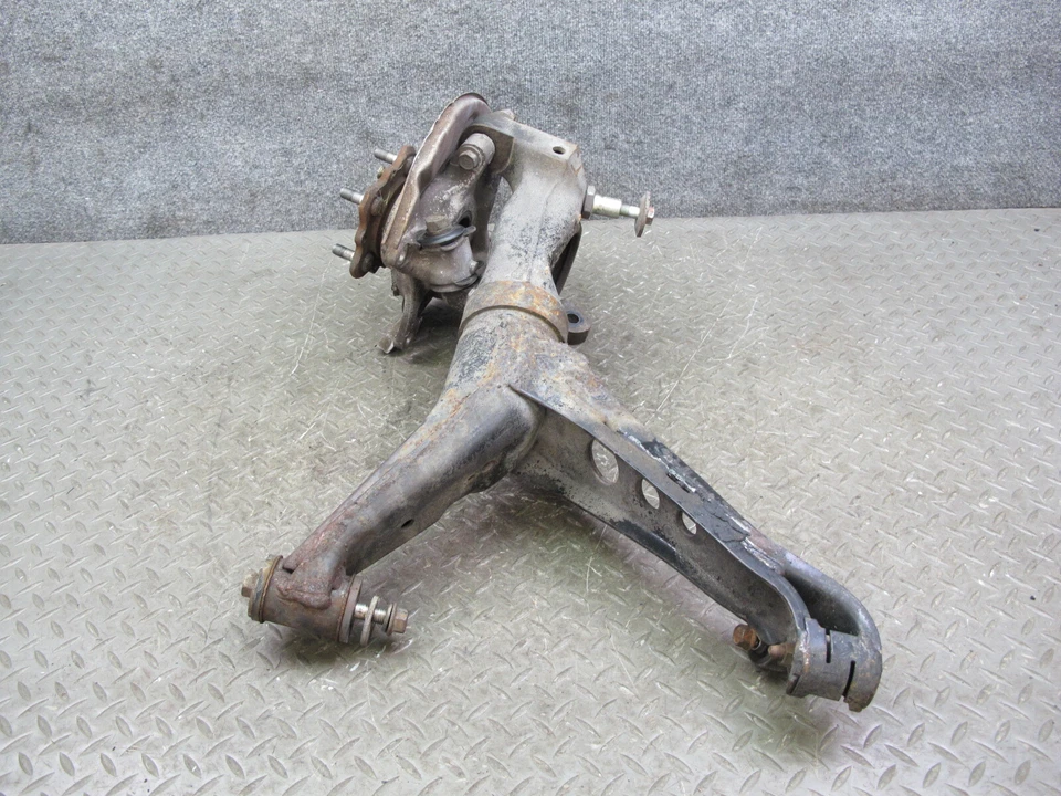 86-91 MAZDA RX7 FC3S HUSILLO TRASERO IZQUIERDO NUDILLO RUEDA BUJE CON BRAZO DE ARRASTRE CONJUNTO OEM Foto 3 de 4