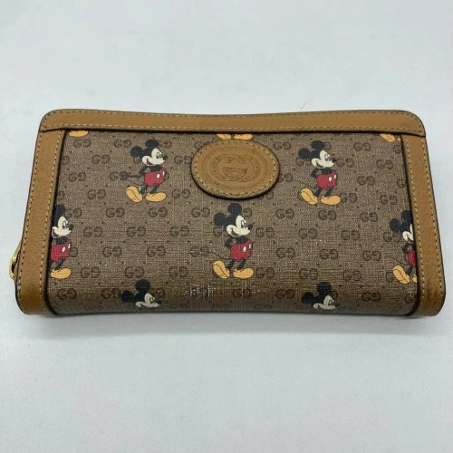 Portefeuille GUCCI x Disney GG Supreme Mickey Mouse zippé autour 602532 fabriqué en Italie