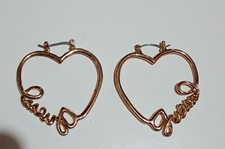 Guess Rolling Hearts Orecchini Con Cuore Traforato Yellow Gold - Acquista A Prezzi Outlet