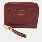 Portefeuille compact zippé en cuir bordeaux Lancel