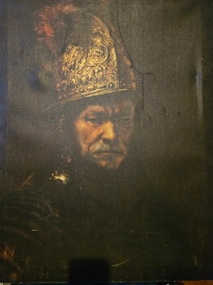 painting of man with the golden helmet by Rembrandt 
