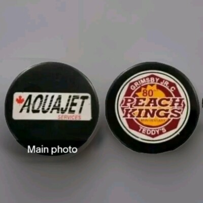 GRIMSBY PEACH KINGS JR. C 80th ANNIVERSARY TEDDY'S AQUAJET VINTAGE SPONSOR PUCK
