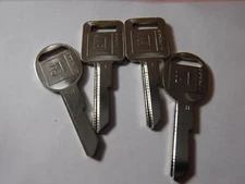 4 NEW GM Logo OEM "E" IGNITION +"H" DOORS/TRUNK Key Blanks Uncut