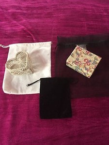 Three Jewelry pouches plus two small jewelry boxes drawstring