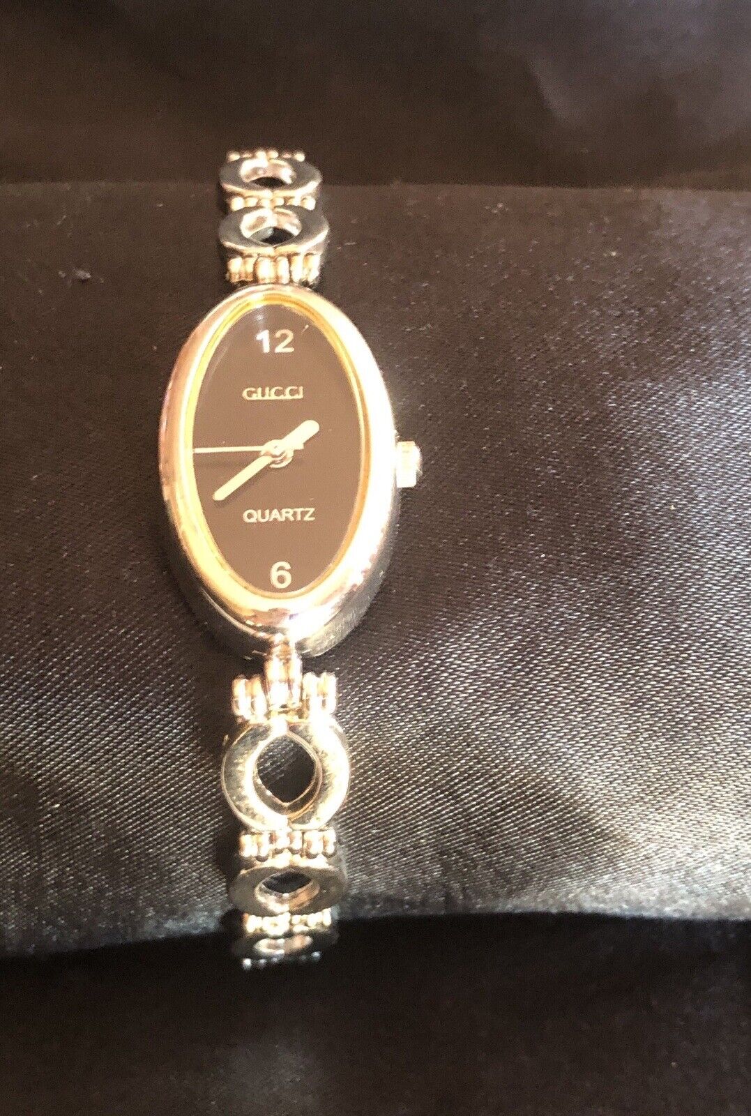 women’s silver gucci watch