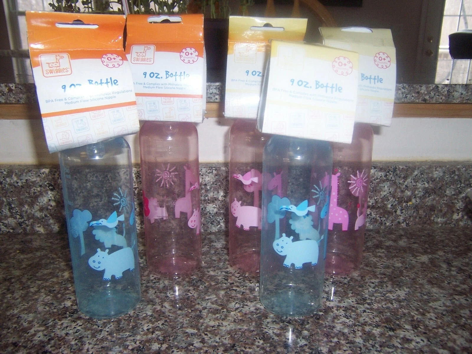 Swiggles 9 oz baby bottles lot New animals