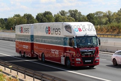 LKW Foto MAN TGS Deichsel Anhänger UK rot GB Liners INTERNATIONAL MOVERS #l2tq