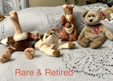 Four Beanie Babies 1999 Signature Bear,Pouch/Kangaroo,Snip/Cat,Stretch/Ostrich