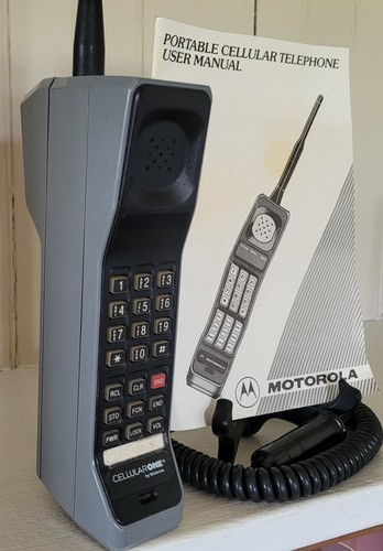 Vintage Motorola "Brick" Cell Phone With Owners Manual Untested.