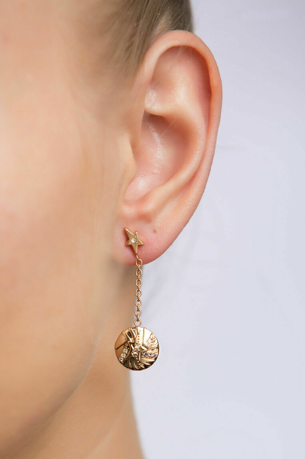 Boucles d'oreilles étoile pendantes Thierry Mugler plaqué or rose bijou créateur tendance