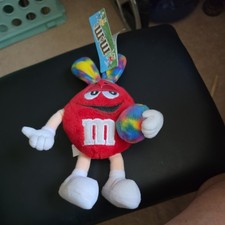 vintage M&M stuffed Red character with rainbow ears and holding ball