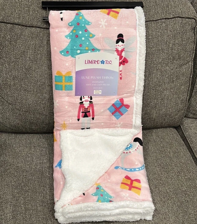 Pink christmas throw hot sale