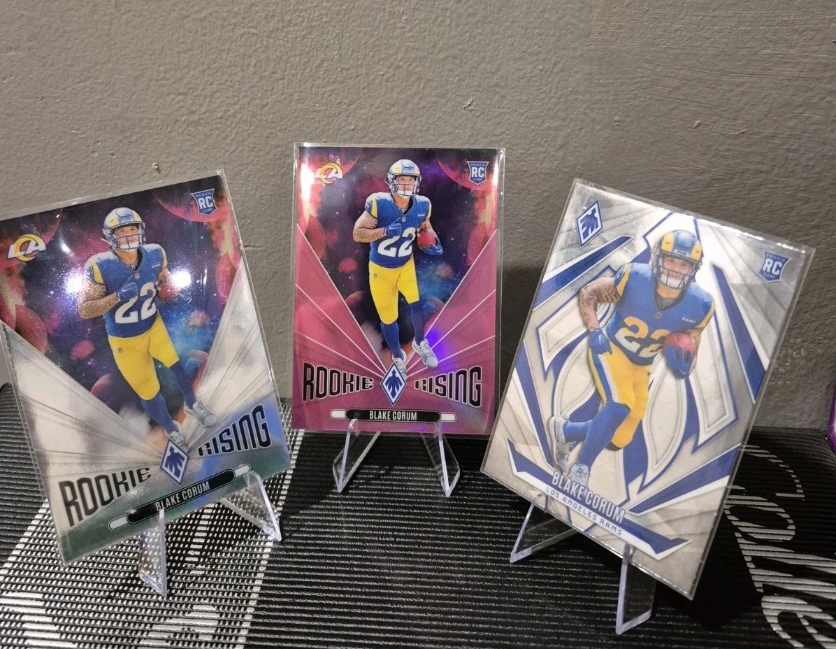 2024 Phoenix Blake Corum Rookie Rising#RR-BCM Pink /80 & Rookie Rising (RC)