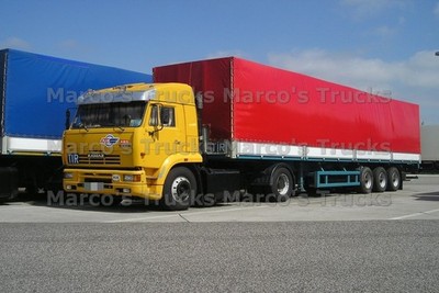 Truck photo KamAZ 54115 Tarpaulin trailer Russia yellow KamAZ RTC TIR #c2cu